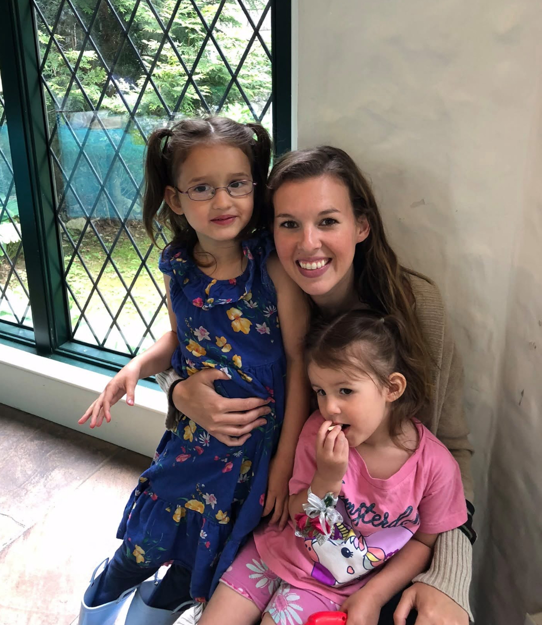 Amanda Zinsser, owner and operator of JoyJar Kids, with two children